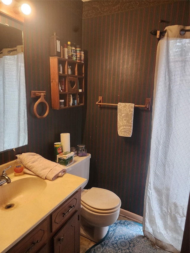 bathroom with vanity and toilet