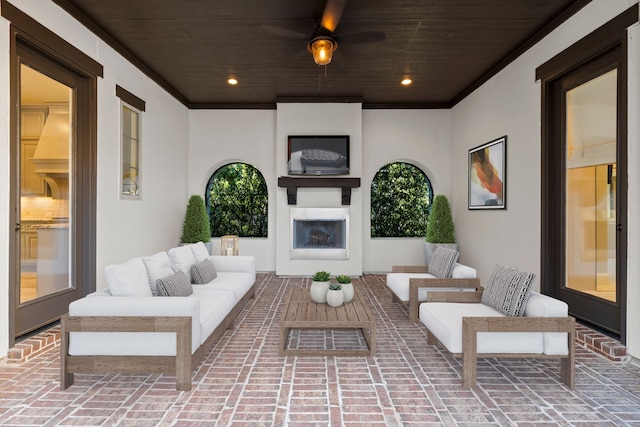 view of patio / terrace featuring a ceiling fan and an outdoor living space