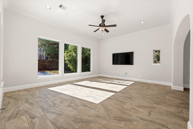 unfurnished living room featuring visible vents, arched walkways, baseboards, and ornamental molding