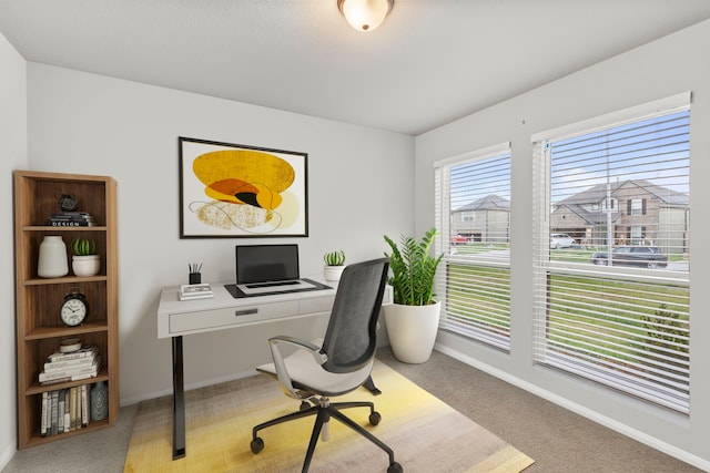 view of carpeted office space