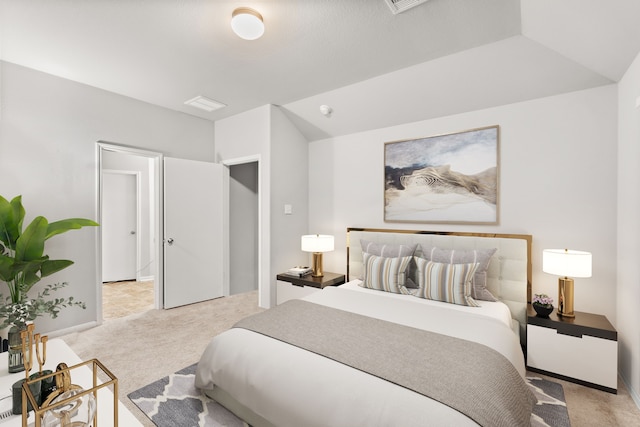 bedroom featuring light carpet