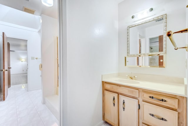 bathroom featuring vanity and tile patterned floors