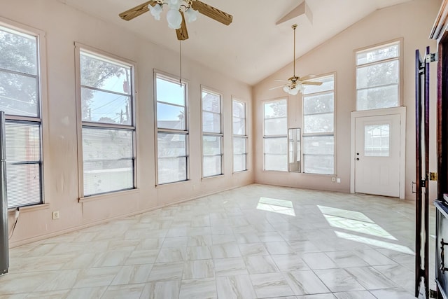 unfurnished sunroom with vaulted ceiling and ceiling fan