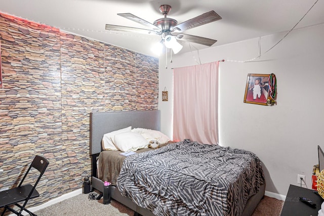 bedroom with ceiling fan and carpet