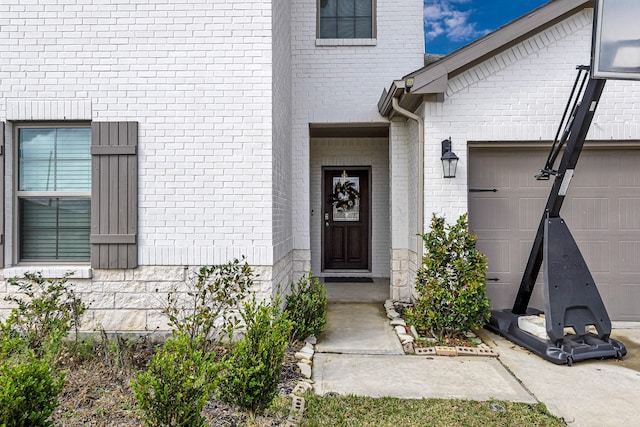 doorway to property featuring a garage