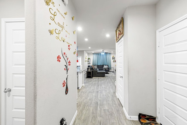 hallway featuring light hardwood / wood-style flooring