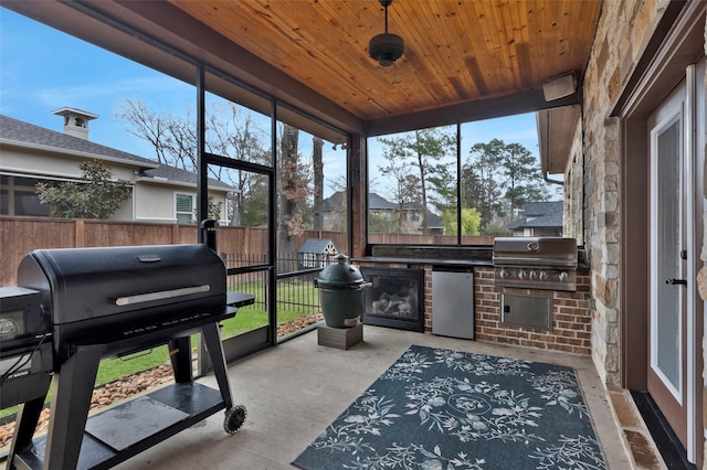 sunroom / solarium with wood ceiling