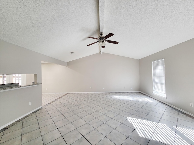 unfurnished living room featuring light tile patterned flooring, ceiling fan, lofted ceiling with beams, and a textured ceiling