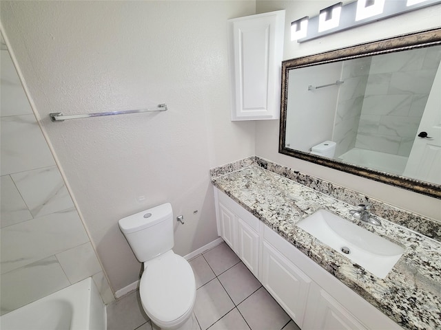 bathroom featuring tile patterned floors, toilet, and vanity