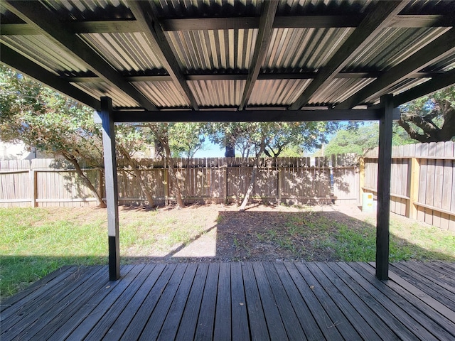 wooden terrace with a yard