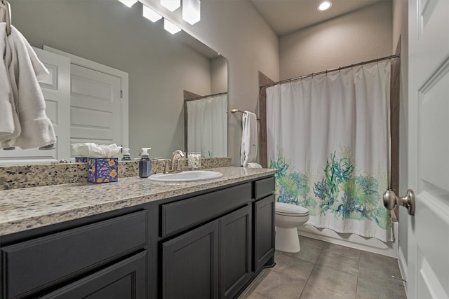 full bathroom featuring vanity, tile patterned flooring, shower / bath combination with curtain, and toilet