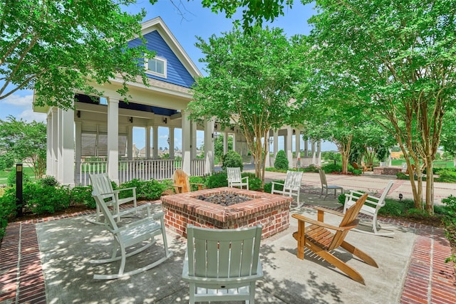 view of patio featuring an outdoor fire pit