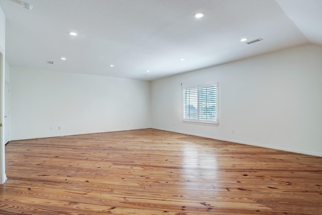 5419 W Bayshore Dr, Bacliff, TX 77518 - empty room featuring light wood-style floors, recessed lighting, and a smoke detector