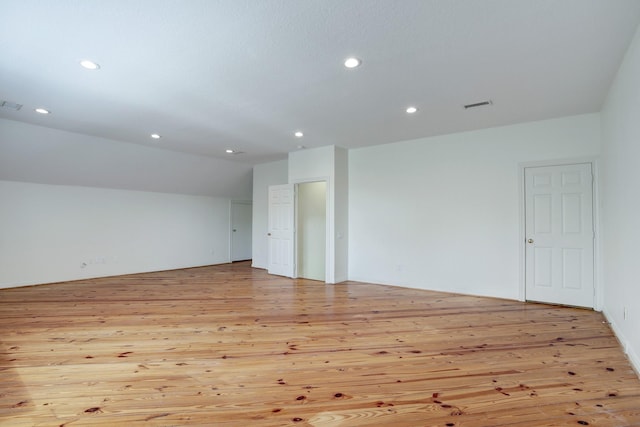 5419 W Bayshore Dr, Bacliff, TX 77518 - spare room with light wood-type flooring, recessed lighting, and vaulted ceiling
