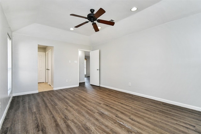 unfurnished bedroom featuring dark hardwood / wood-style flooring and ceiling fan