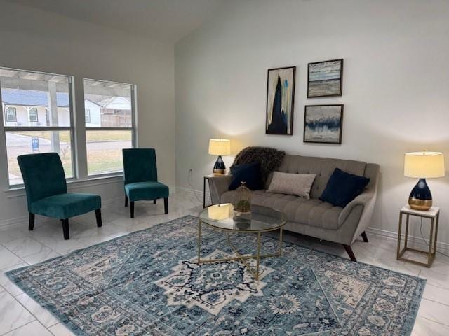 2748 Cos St, Liberty, TX 77575 - living area with baseboards and lofted ceiling