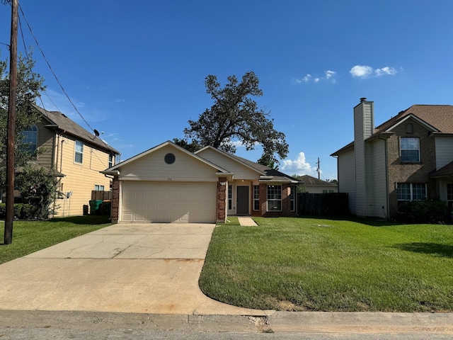 view of front of house featuring a garage and a front yard