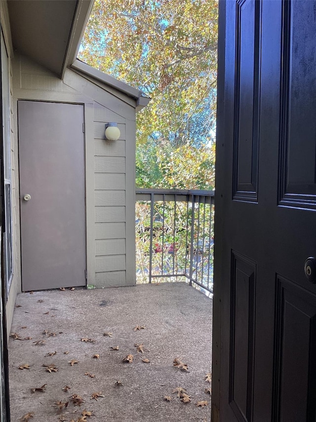 doorway to property with a balcony