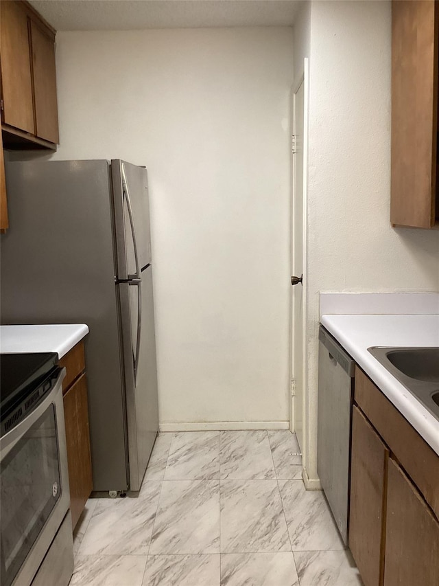 kitchen with stainless steel appliances and sink