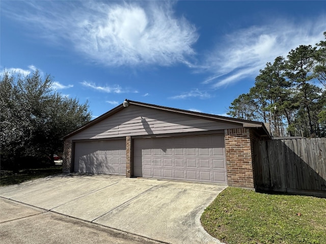 garage featuring fence