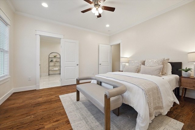 bedroom with crown molding, ceiling fan, and dark hardwood / wood-style floors