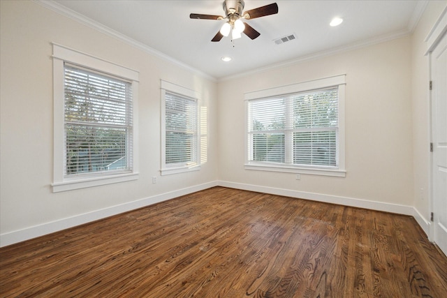 empty room with crown molding, ceiling fan, and dark hardwood / wood-style flooring