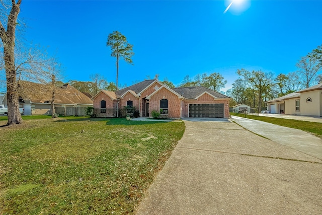 view of front of property featuring driveway, a garage, fence, a front lawn, and brick siding