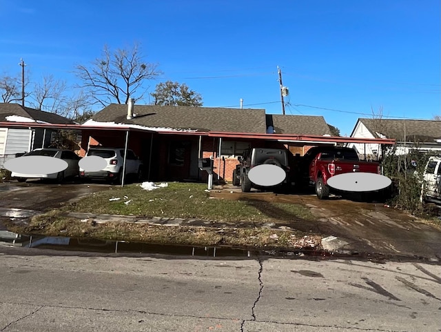 view of front of house featuring a carport