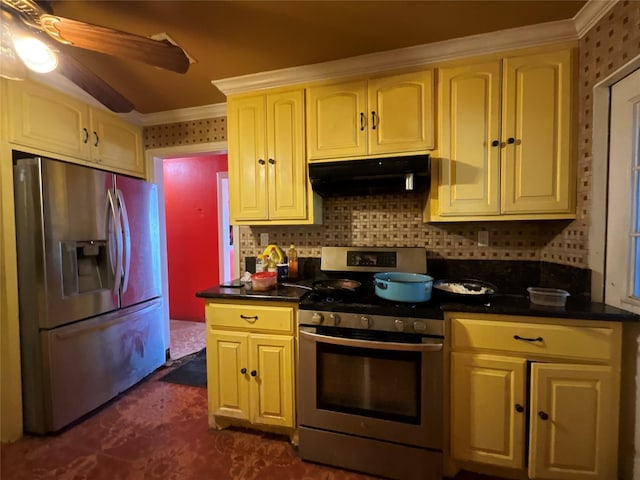 kitchen featuring backsplash, ornamental molding, stainless steel appliances, and ceiling fan