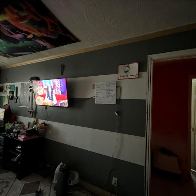 interior space with a textured ceiling