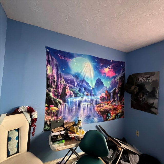 bedroom featuring a textured ceiling