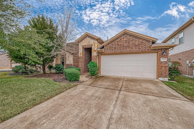 view of front of property featuring a garage and a front lawn