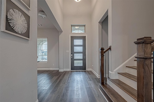 entrance foyer with dark hardwood / wood-style flooring