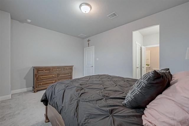 bedroom with light carpet