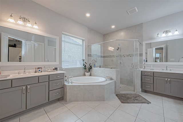 bathroom featuring vanity, tile patterned floors, and independent shower and bath