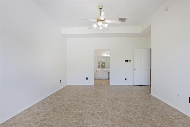 empty room featuring ceiling fan