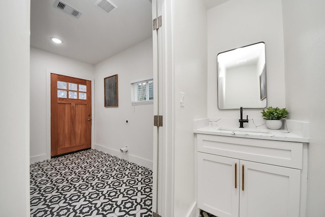 entrance foyer featuring sink