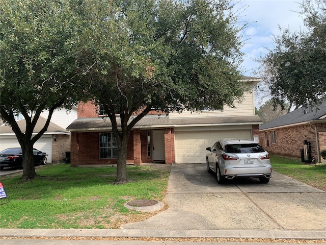 view of front of house featuring a garage and a front lawn