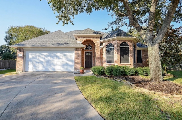 single story home with a garage