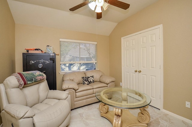 living room with vaulted ceiling and ceiling fan