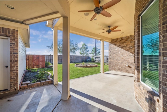 view of patio / terrace featuring ceiling fan