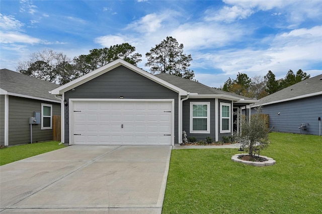 ranch-style house with a garage and a front lawn