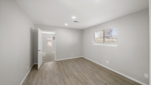 empty room featuring light hardwood / wood-style flooring