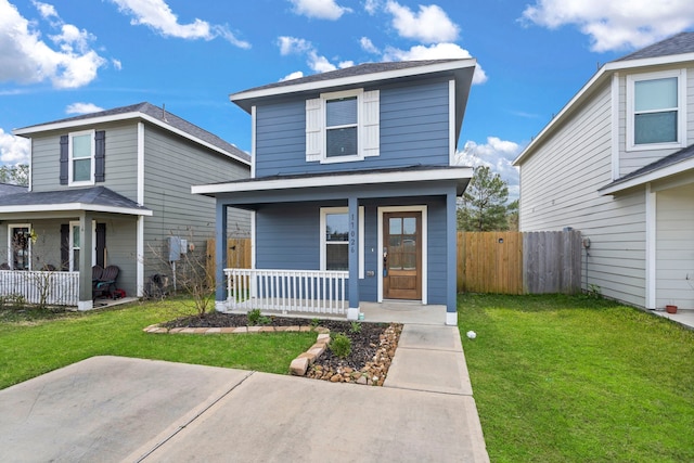 view of property featuring a front yard and a porch