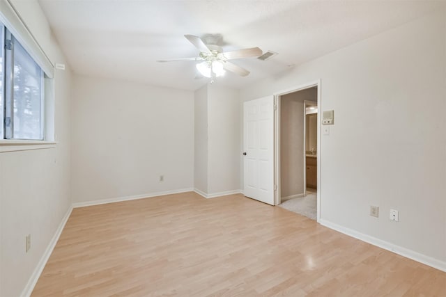 unfurnished room featuring light hardwood / wood-style floors and ceiling fan