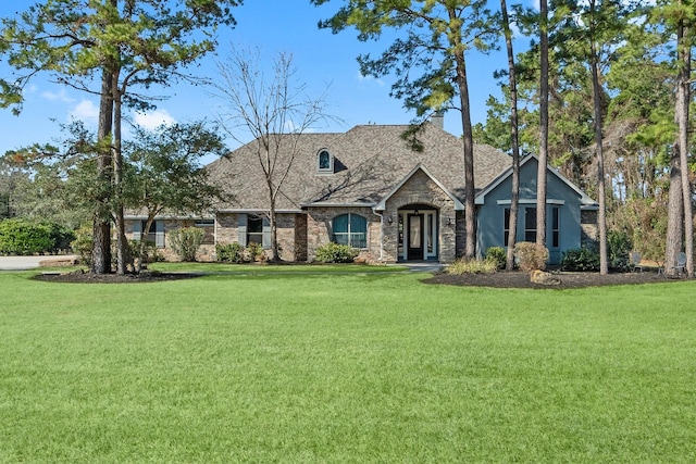 view of front of home with a front yard