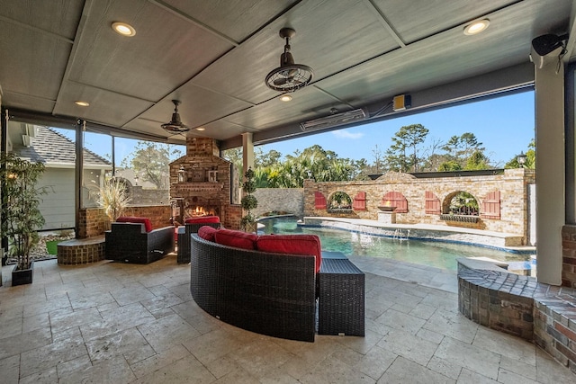 view of patio with a fenced in pool, pool water feature, an outdoor living space with a fireplace, and ceiling fan