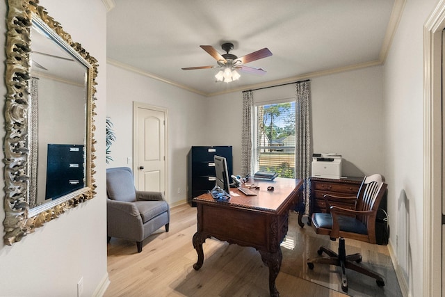 office with ornamental molding, ceiling fan, and light hardwood / wood-style floors