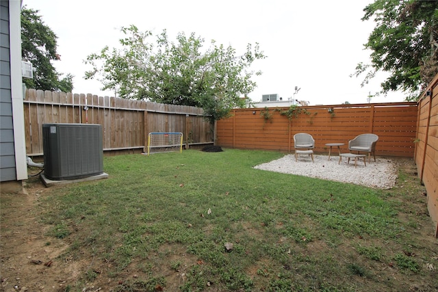 view of yard featuring a patio and cooling unit