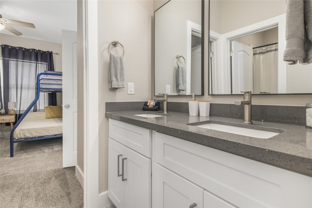 bathroom featuring vanity and ceiling fan